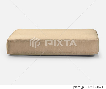 Beige rectangular cushion resting on white surface 125154621