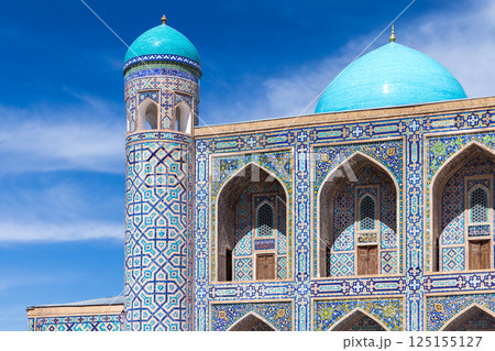 Tilya-Kori Madrasah facade on a sunny day. Registan square, Samarkand 125155127