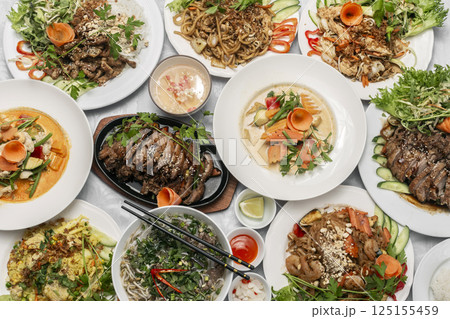 assortment of mixed traditional vietnamese food dishes on buffet table 125155459
