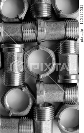 Sanitary And Water Plumbing Products. Cast Iron Fitting And Nuts For Piping Connection Texture Background 125155533