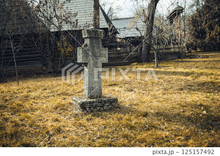 Cross On The Grass Of The Old Romanian Park  125157492