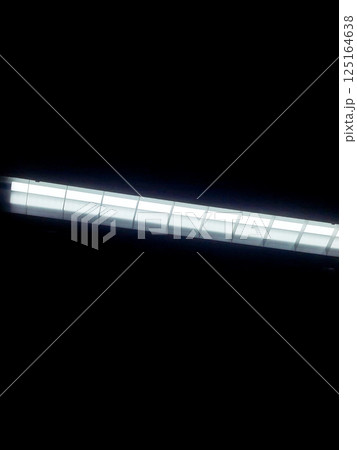 light trails of toy on black background light trails of toy on black background 125164638
