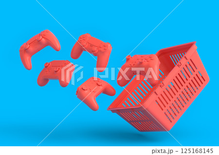 Set of flying gamer joysticks or gamepads in plastic basket on monochrome Set of flying gamer joysticks or gamepads in plastic basket on monochrome 125168145
