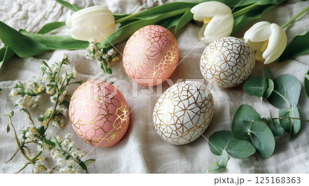 Elegant decorative easter eggs with floral surroundings in soft pastel colors. 125168363