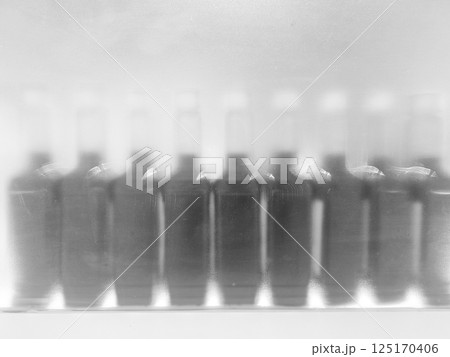 Dirty and Dusty on Glass Window Background with Reflection of Bottles. Dirty and Dusty on Glass Window Background with Reflection of Bottles. 125170406