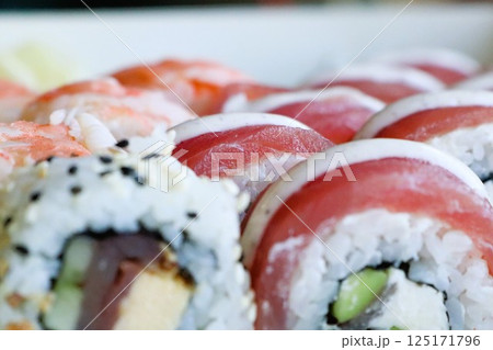 Indulge in Delicious Sushi Rolls that are Prepared with Only the Freshest Ingredients 125171796