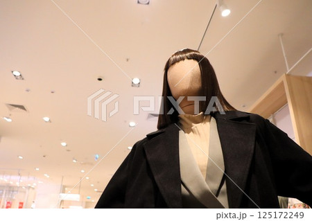 A Stylish Mannequin Display Set in a Contemporary Retail Environment for Enhanced Appeal A Stylish Mannequin Display Set in a Contemporary Retail Environment for Enhanced Appeal 125172249