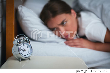 Sleep Disorder. Young Woman Looking At Clock Lying In Bed Suffering From Insomnia At Home. Selecive Focus 125172837