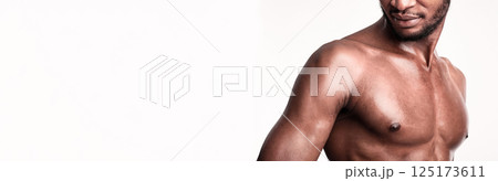 Sporty Black Bodybuilder Posing Standing In Studio On White Background. Building Chest Muscles Concept. Panorama, Cropped Sporty Black Bodybuilder Posing Standing In Studio On White Background. Building Chest Muscles Concept. Panorama, Cropped 125173611