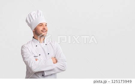 Successful Chef. Confident Cook Man Crossing Hands Looking At Copy Space Standing Over White Studio Background. Panorama 125173949