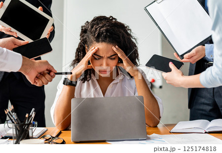Multitasking. Overworked Business Lady Sitting Stressed By A Lot Of Tasks At Work In Modern Office. 125174818