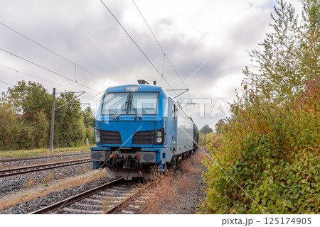 Train transporting fuel storage tanks, in Baden Wurttemberg, Germany 125174905