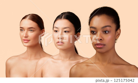 Portrait Of Three Beautiful Diverse Girls Posing Standing Over White Studio Background. Beauty And Body Care Concept. Panorama, Isolated 125175042
