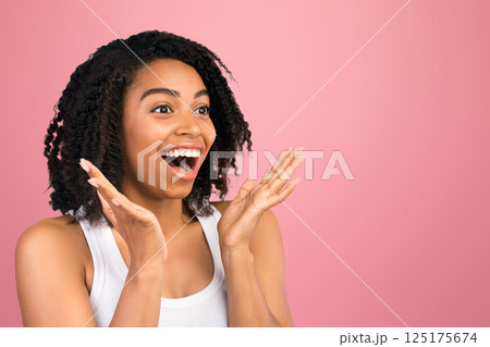 Big Sale Concept. Panorama of surprised african woman staring at copy space over isolated white studio background 125175674