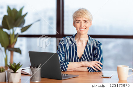 Business Career. Successful Businesswoman At Laptop Smiling To Camera Sitting In Modern Office. Selective Focus 125175970