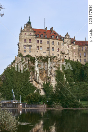 Majestic Sigmaringen Castle Perched on Rugged Cliff Above Tranquil Danube: Historic Hohenzollern Residence Showcases Medieval Architecture and Royal Collections in Picturesque Baden-Wurttemberg Majestic Sigmaringen Castle Perched on Rugged Cliff Above Tranquil Danube: Historic Hohenzollern Residence Showcases Medieval Architecture and Royal Collections in Picturesque Baden-Wurttemberg 125177656