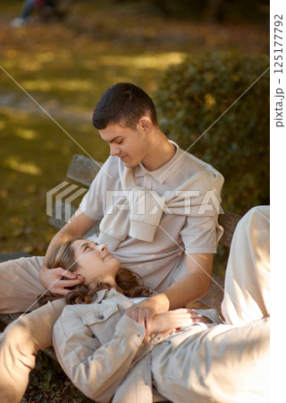 Young Cute Female Hugs Boyfriend. In Autumn Outdoor. Lovers Walking in Park. Attractive Funny Couple. Lovestory in Forest. Man and Woman. Cute Lovers in the Park. Family Concept. Happy Couple. Young Cute Female Hugs Boyfriend. In Autumn Outdoor. Lovers Walking in Park. Attractive Funny Couple. Lovestory in Forest. Man and Woman. Cute Lovers in the Park. Family Concept. Happy Couple. 125177792