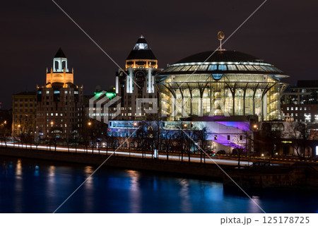 Concert Hall and City Lights Reflected in River at Night Concert Hall and City Lights Reflected in River at Night 125178725