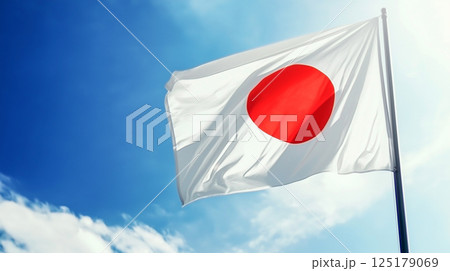 Japan flag waving against a clear blue sky 125179069