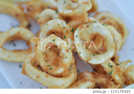 calamari or fried squid , crispy squid calamari or fried squid , crispy squid 125179385