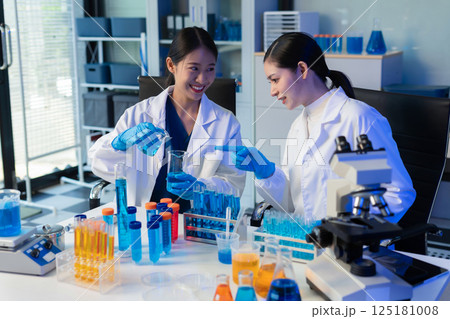 Glass vial, pipette and scientist in laboratory for medical study, research or experiment. Test tube, dropper and professional person with chemical liquid for pharmaceutical innovation. Glass vial, pipette and scientist in laboratory for medical study, research or experiment. Test tube, dropper and professional person with chemical liquid for pharmaceutical innovation. 125181008