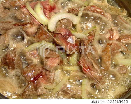 Boiling meat dish close view culinary background 125183436