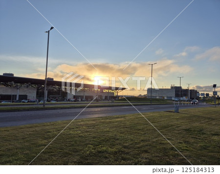 Dusk Skyline with Street Light and Cumulus Clouds Dusk Skyline with Street Light and Cumulus Clouds 125184313