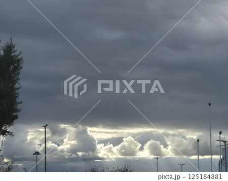White cumulus clouds in the stormy sky White cumulus clouds in the stormy sky 125184881