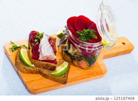 Homemade pickled poutassou with beets 125187408