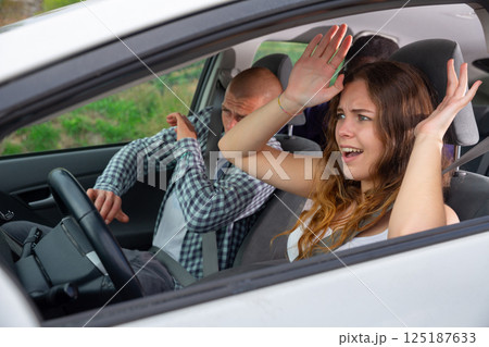 Driver and passengers scared screaming in the car before the accident Driver and passengers scared screaming in the car before the accident 125187633