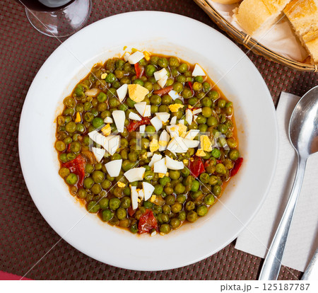 Murcia peas served with egg in sauce Murcia peas served with egg in sauce 125187787