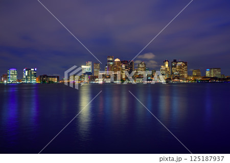 Boston skyline at sunset and river in Massachusetts Boston skyline at sunset and river in Massachusetts 125187937