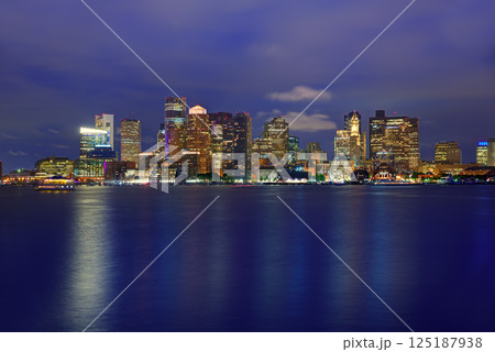 Boston skyline at sunset and river in Massachusetts Boston skyline at sunset and river in Massachusetts 125187938