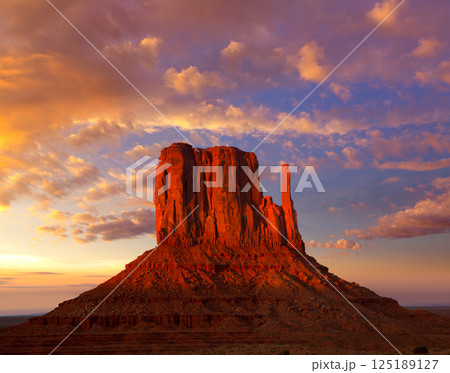 Monument Valley West Mitten at sunset sky 125189127