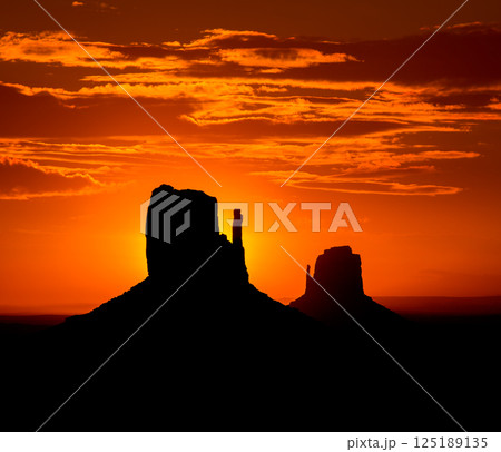 Sunrise at Monument Valley West and East Mittens Butte Sunrise at Monument Valley West and East Mittens Butte 125189135