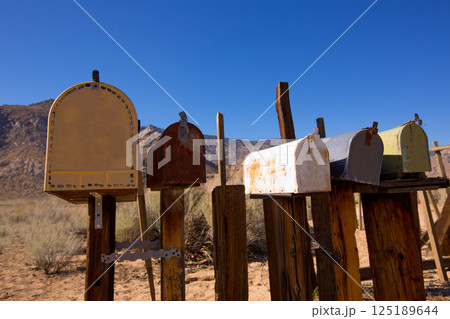 Mailboxes aged vintage in west California desert Mailboxes aged vintage in west California desert 125189644