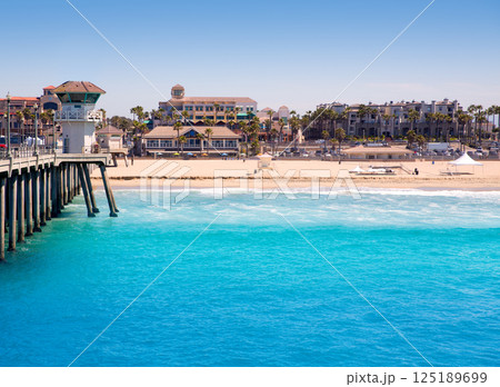 Huntington beach Surf City USA pier with lifeguard tower 125189699