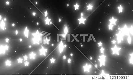 White glowing stars on a black background, creating a high-contrast, celestial pattern with twinkling light effects 125190514