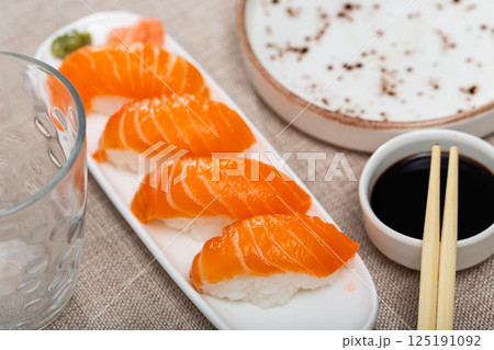 Sake Nigiri served in a plate with soya sauce Sake Nigiri served in a plate with soya sauce 125191092