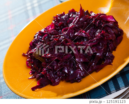 Braised red cabbage in orange plate 125191123