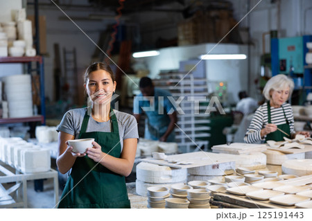 Portrait of positive woman potter Portrait of positive woman potter 125191443