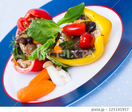 Peppers filled with porcini mushrooms, rice, tomatoes Peppers filled with porcini mushrooms, rice, tomatoes 125191957