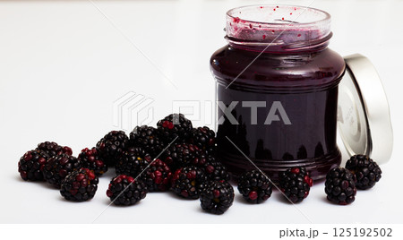 Glass jar of blackberry jam. Summer dish Glass jar of blackberry jam. Summer dish 125192502