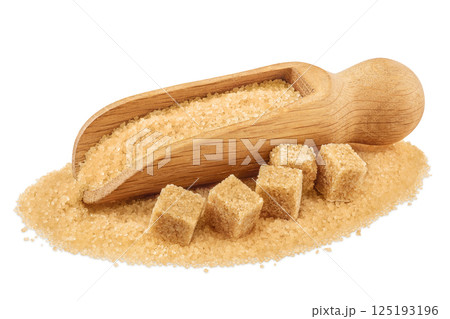 Pile of brown granulated sugar and sugar cubes in wooden scoop isolated on white background. Pile of brown granulated sugar and sugar cubes in wooden scoop isolated on white background. 125193196