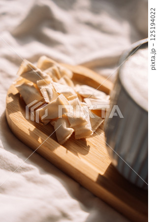 A pile of white of snus pads for breakfast with coffee. Swedish nicotine pouches A pile of white of snus pads for breakfast with coffee. Swedish nicotine pouches 125194022