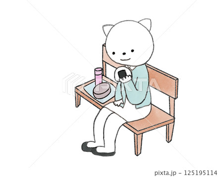 ベンチに座ってお弁当を食べてる猫 125195114