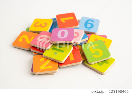 Number wood block cubes for learning Mathematic, education math concept. 125198463