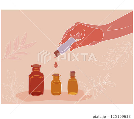 精油を遮光瓶にポトっとたらして広がる香りの世界 125199638