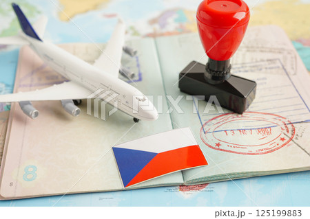 Czech flag and passport with airplane for travel. 125199883