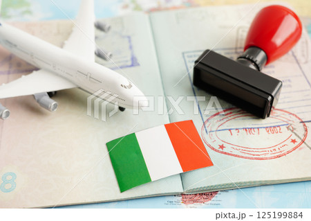 Italy flag and passport with airplane for travel. Italy flag and passport with airplane for travel. 125199884